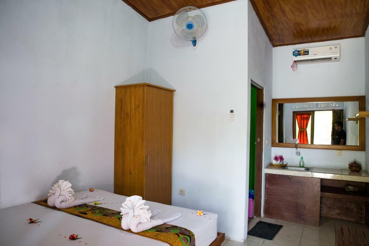 Van Santri Homestay Pemuteran Bagian luar foto