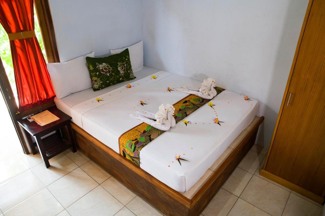 Van Santri Homestay Pemuteran Bagian luar foto